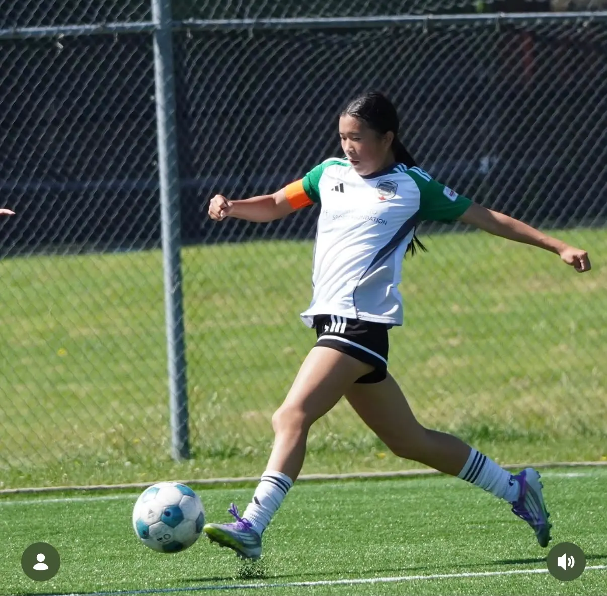 Angelina preparing to strike the ball