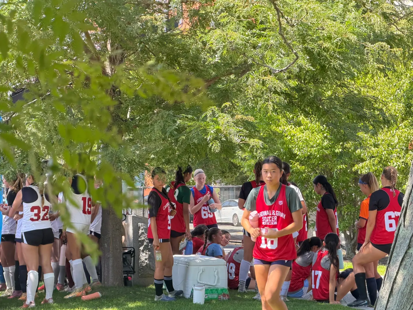 Angelina walking from the sideline at a summer soccer combine
